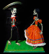 Charro and China Poblana in
 papier mache by Miguel Linares